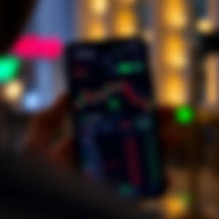 Smartphone displaying IQ Option trading app interface with charts and trading options